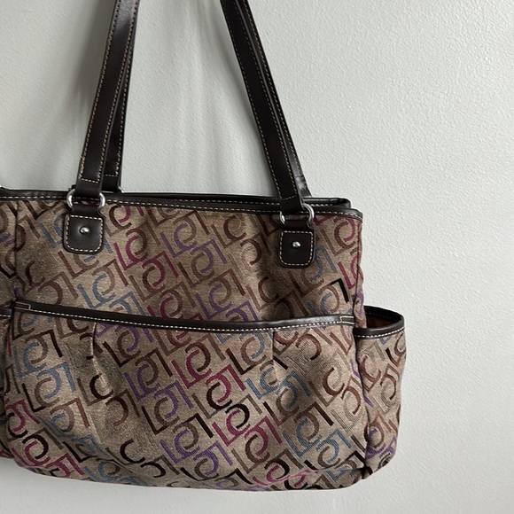 Gently used and lot of space for all of your things plus two side pockets. - Picture 2 of 3